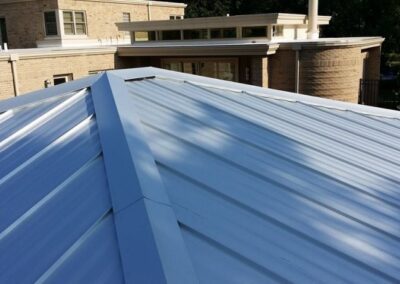 a roof with a metal roof and a building